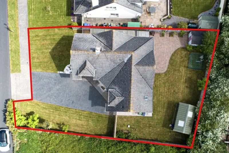 The rear garden lawn at 25 Airfield Point