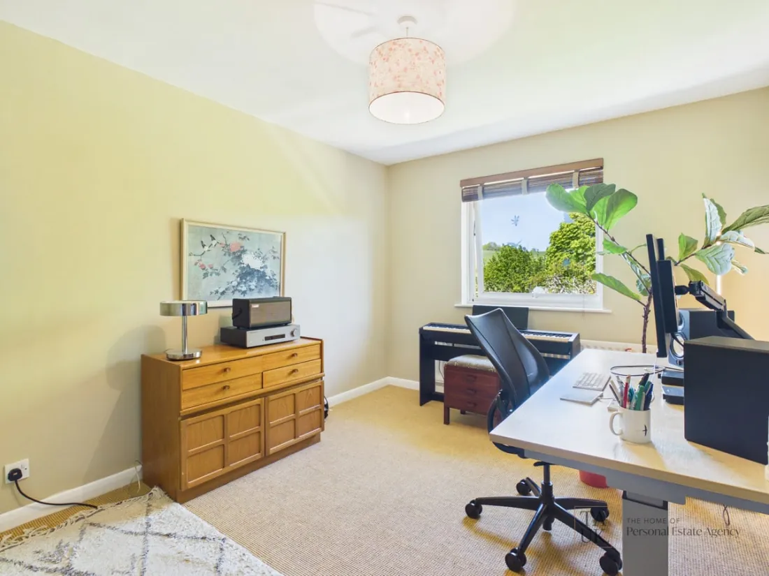 A bedroom arranged as a study