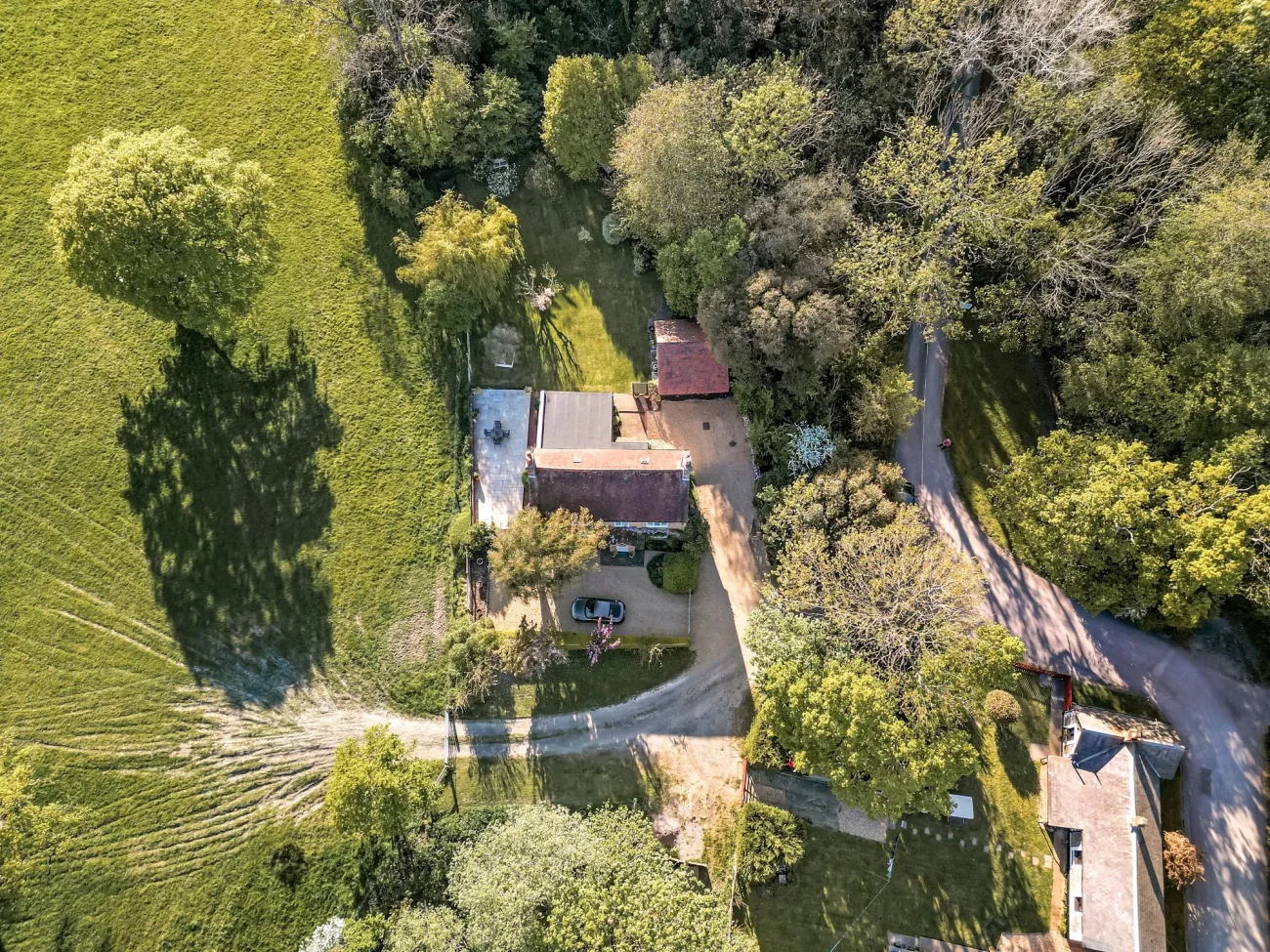 Aerial of cottage in context