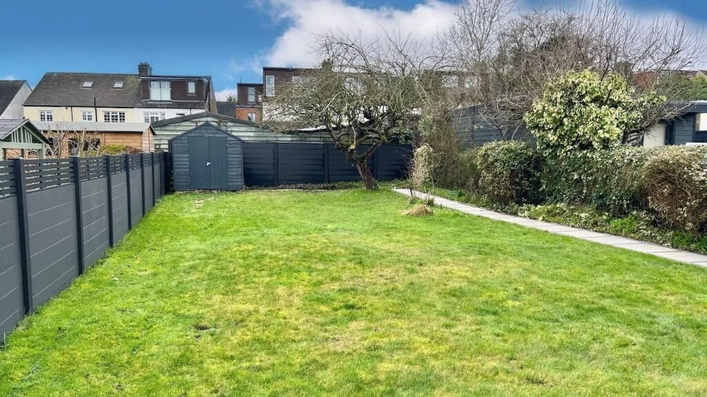 West-facing rear garden from the house looking down the lawn