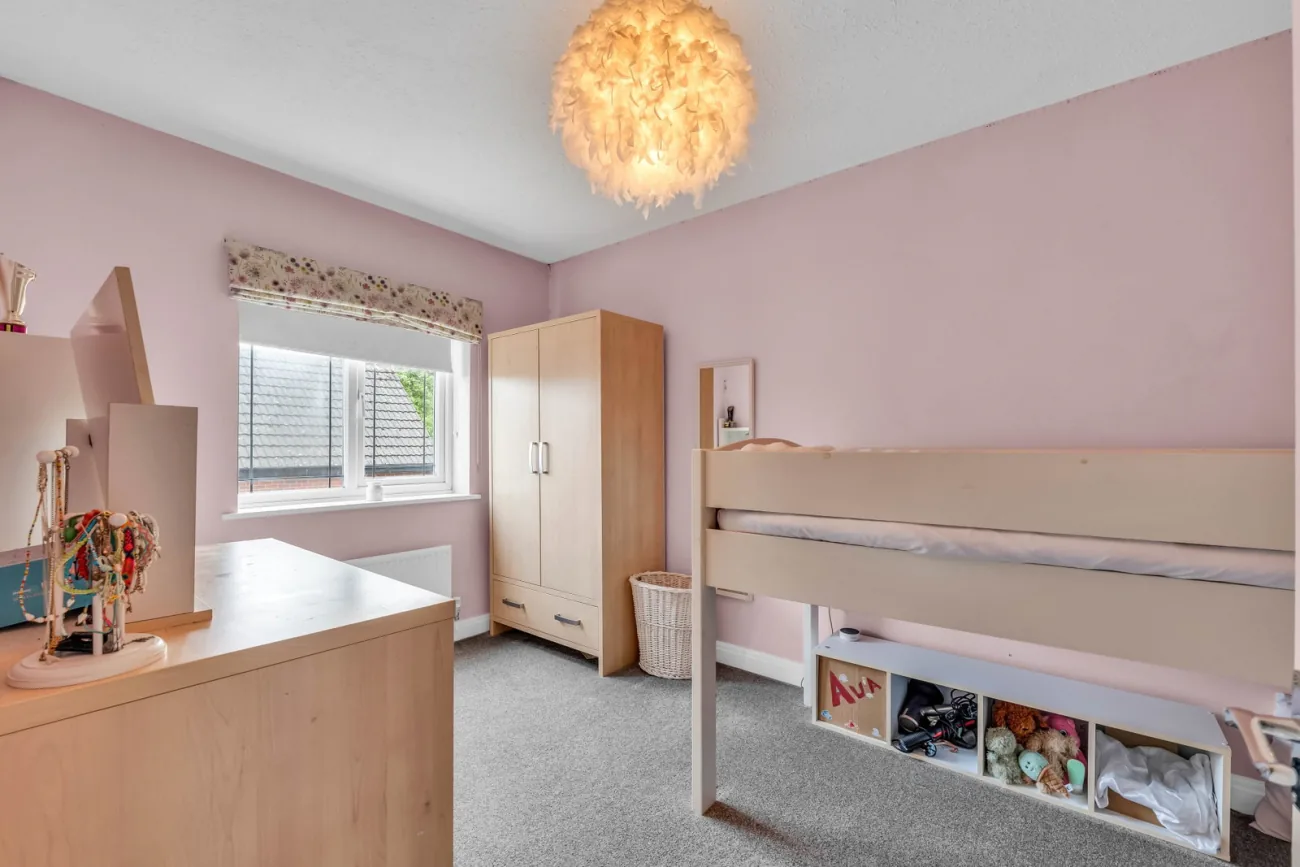 The principal bedroom with walk-in wardrobe