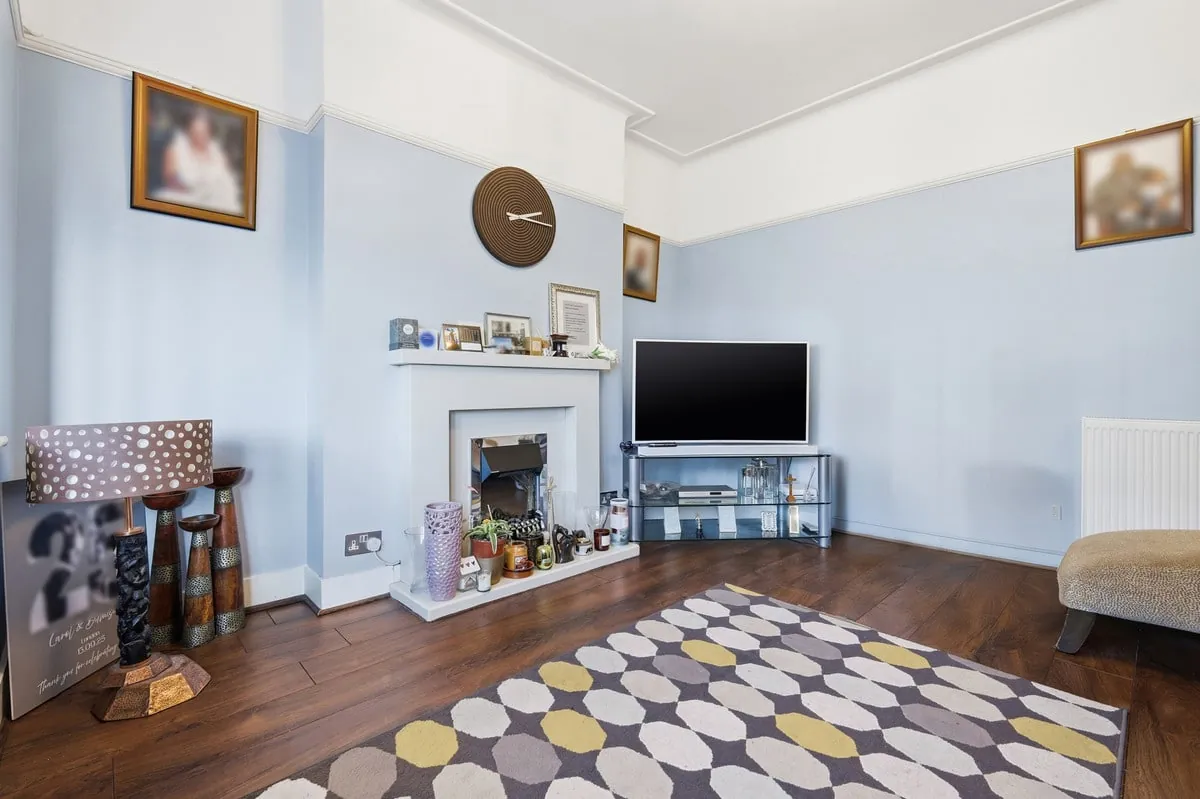 Living room — chimney-breast alcove with media display