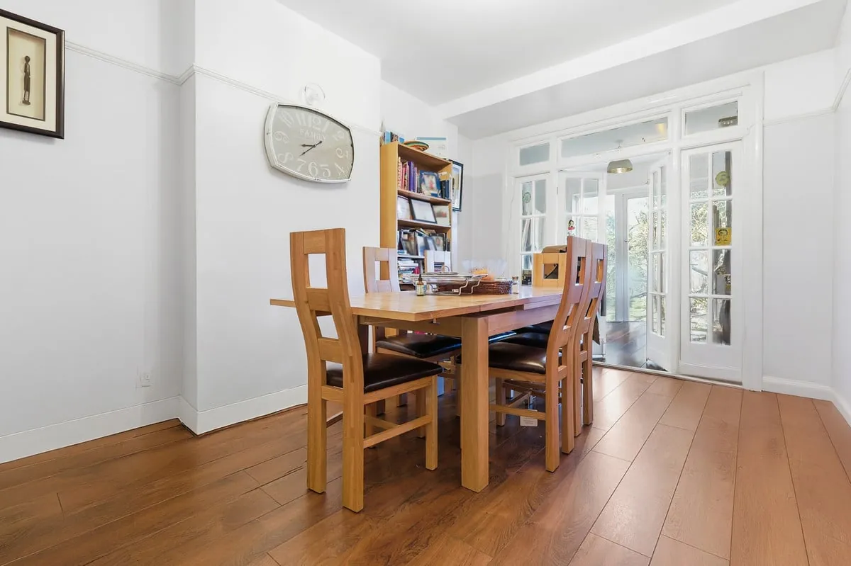 Dining room with French doors opening to the rear garden