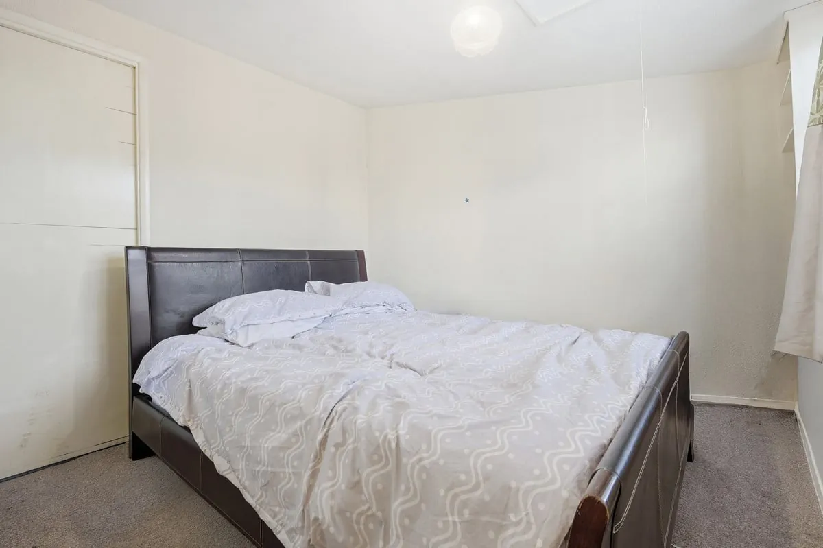 Fourth bedroom — flexible double or single configuration