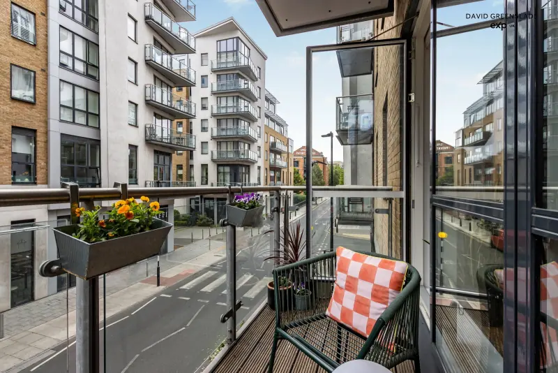 The private balcony off the living area