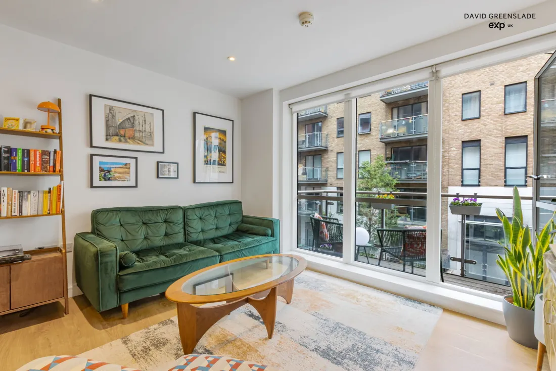 The living area seen toward the windows