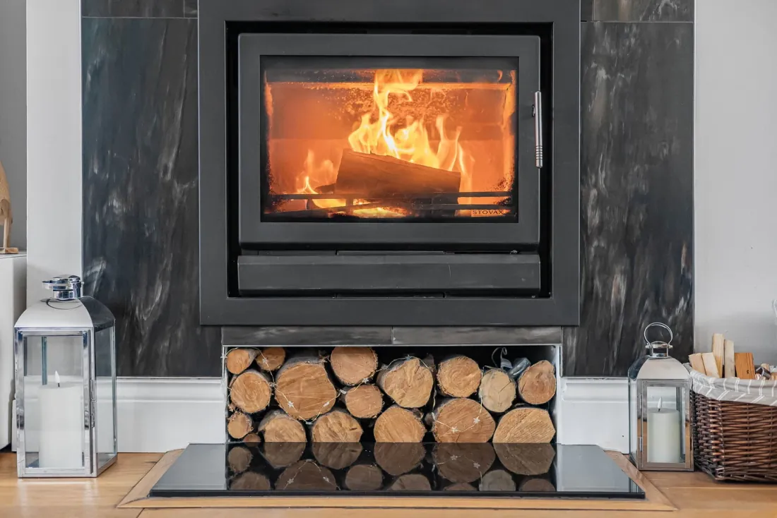 The wood-burning stove at the heart of the sitting room