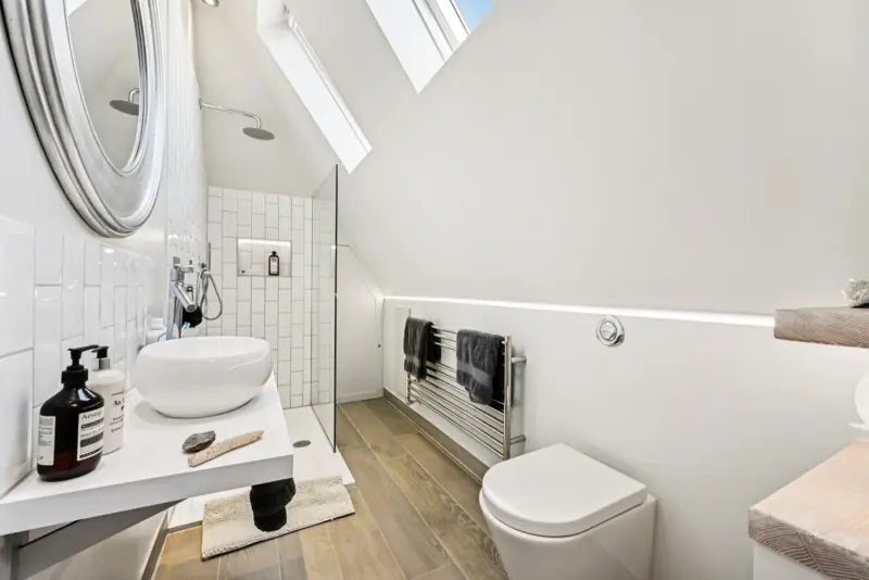 A further bathroom with freestanding bath
