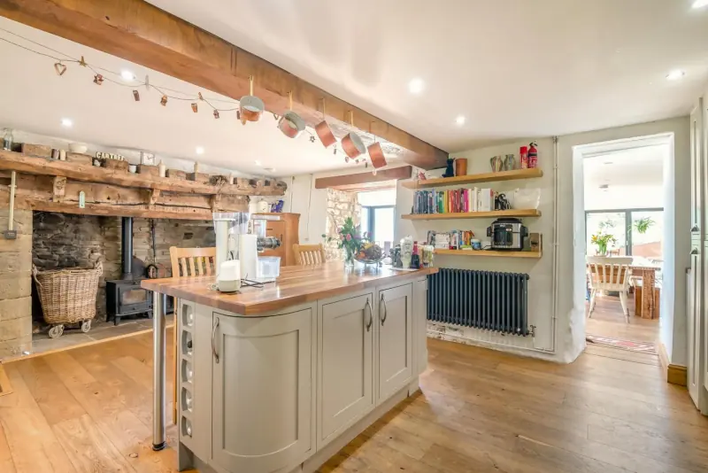Kitchen-dining wing under exposed beams