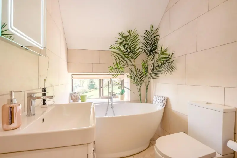 Family bathroom with freestanding tub
