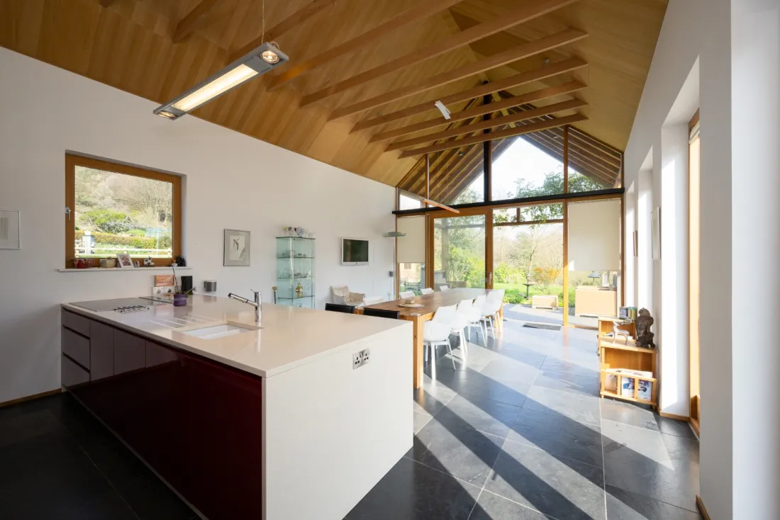 Vaulted kitchen-dining at the heart of the home