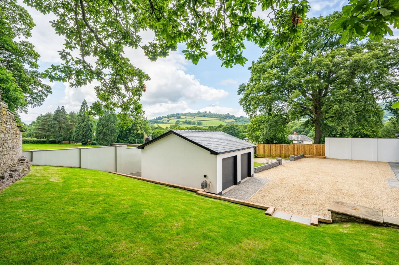 The double garage within the grounds