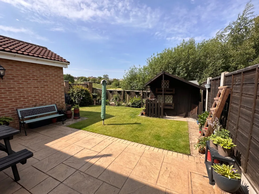 Millcroft — garden patio with open countryside