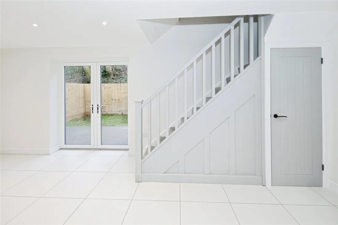 Hallway at the foot of the stairs.