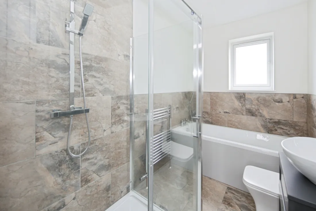 Family bathroom — bath, walk-in shower.