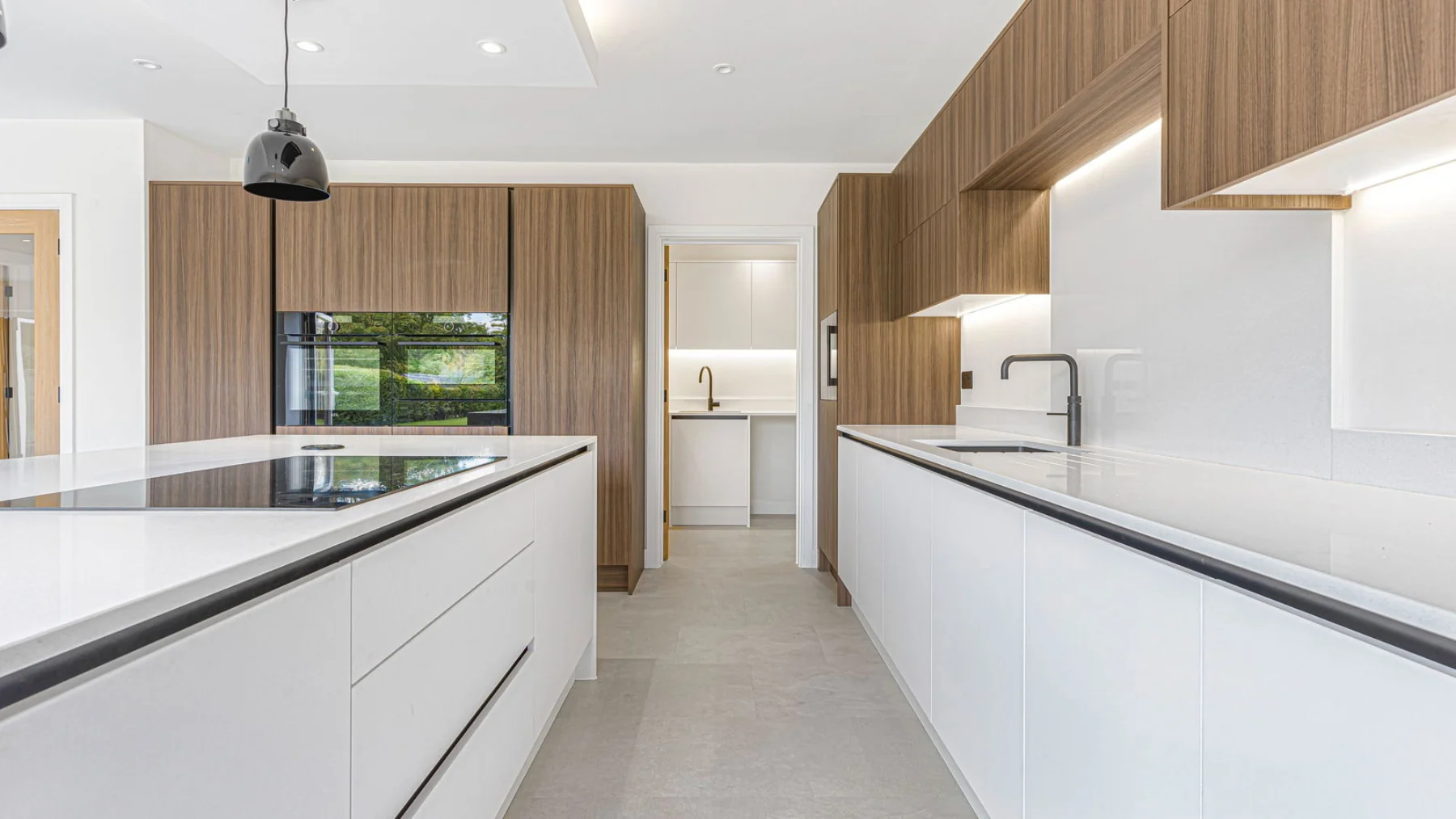 Open-plan kitchen, dining and living space.