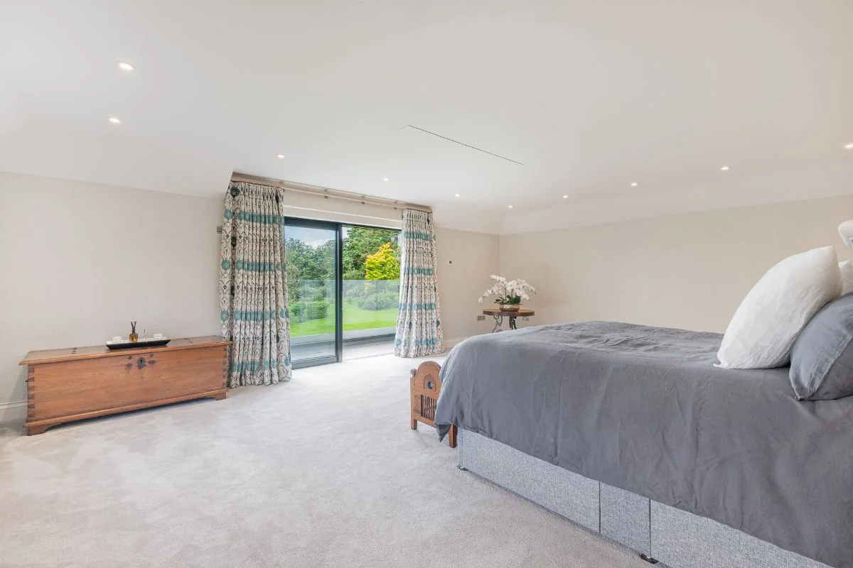 A further bedroom opening to the garden