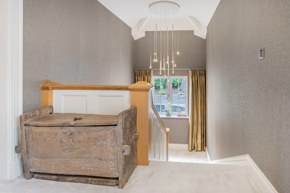 A bedroom within the upper-floor suite