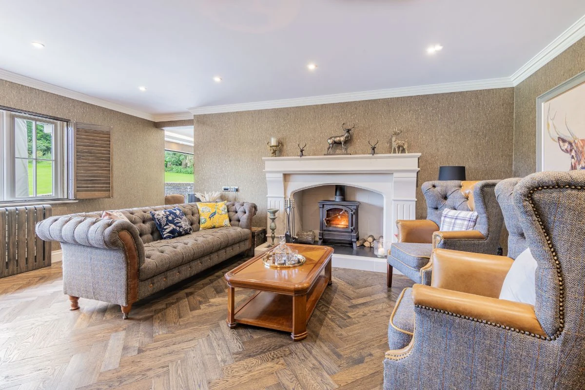 The formal lounge and fireplace