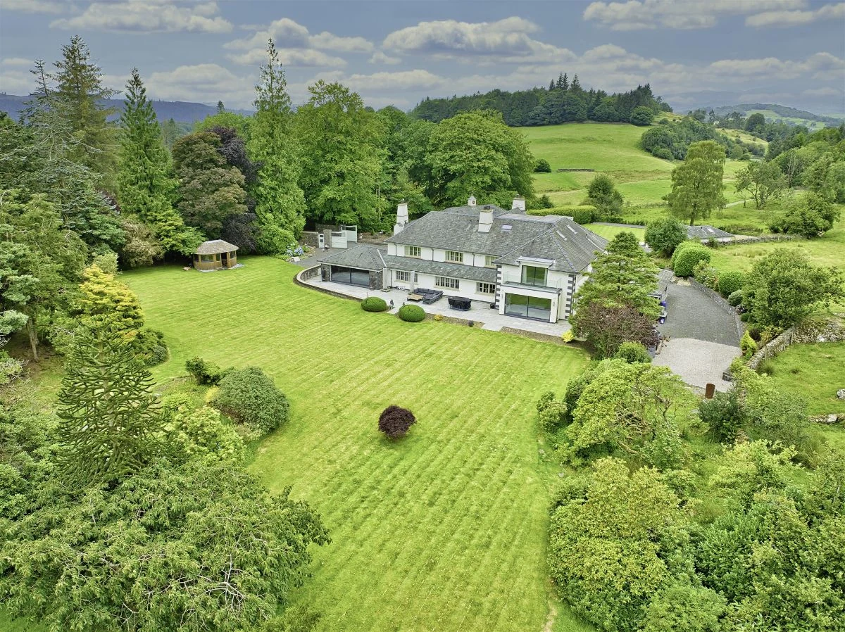 Aerial view of Parrock Cross within its grounds and paddock