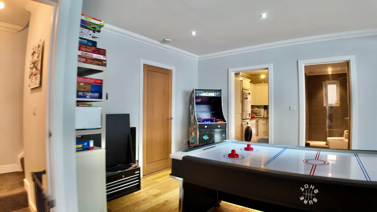 Lower-ground reception with log burner