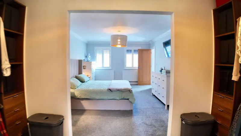 Master bedroom from the wardrobe end