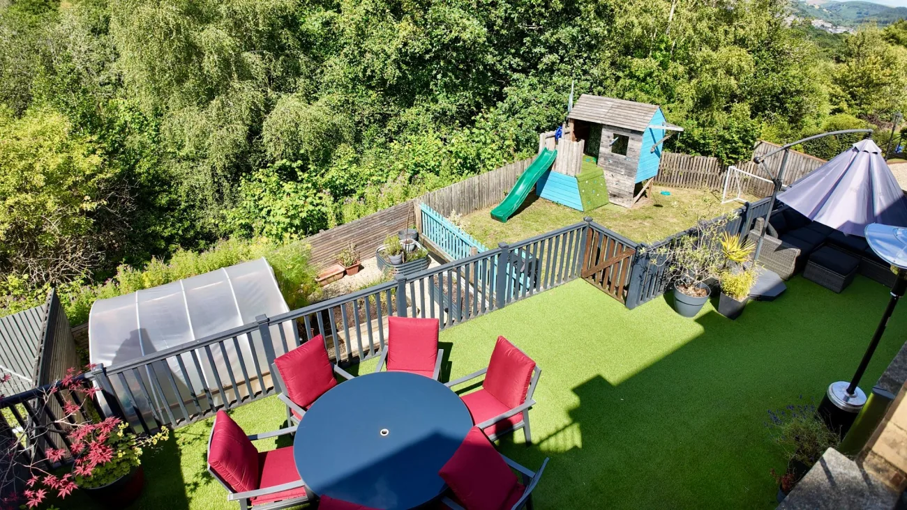 Landscaped rear garden with country views