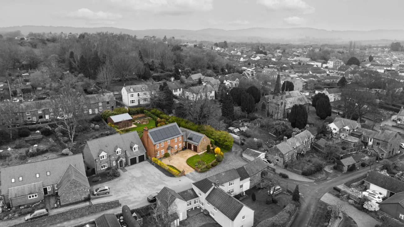 Aerial view of the home and its plot.