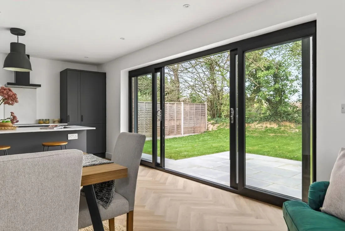 The kitchen, breakfast and dining room — wide view