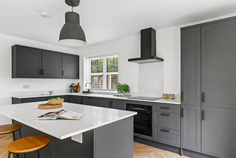 The kitchen island and pendant lights