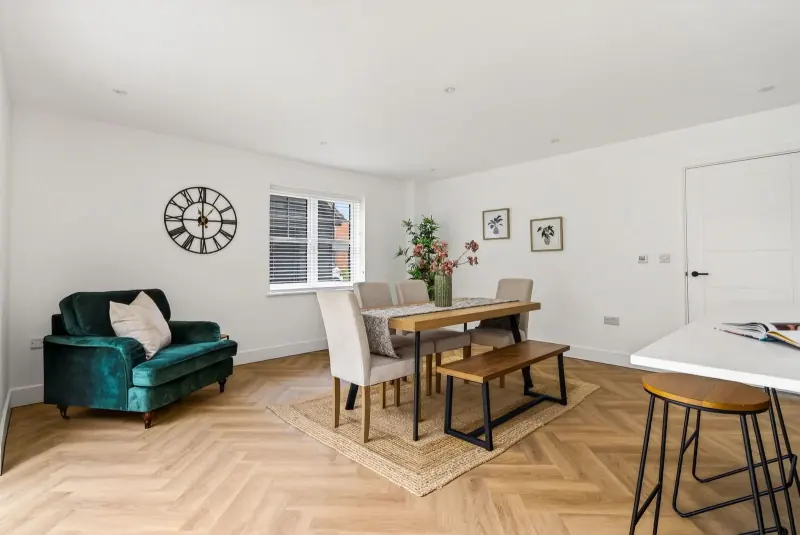 The dining end with herringbone flooring