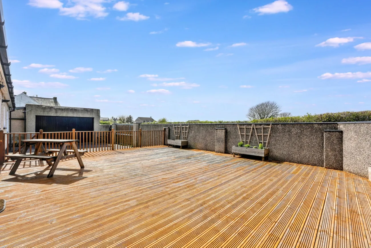 The west-facing rear deck with open fields behind