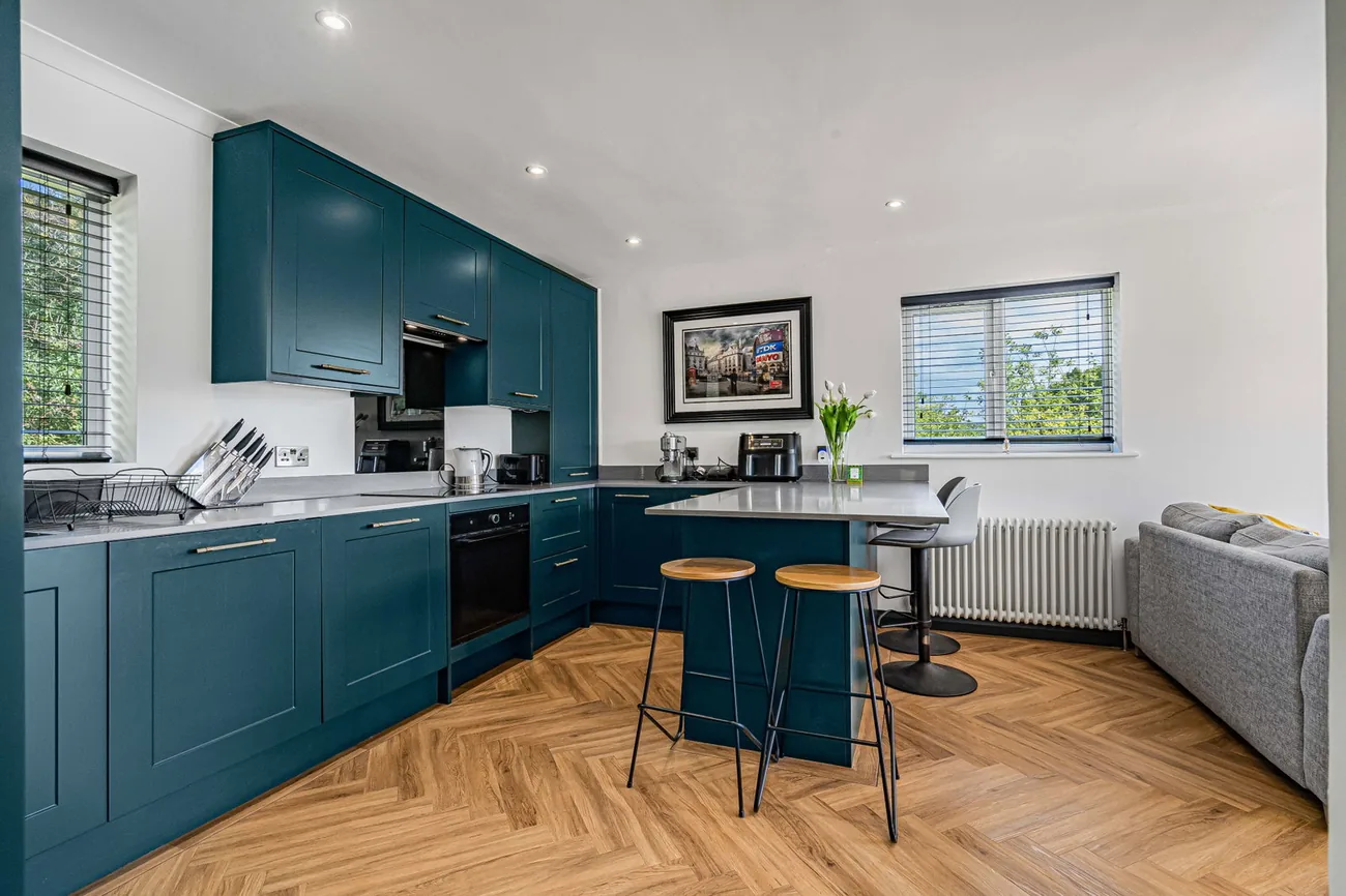 Kitchen-to-balcony flow.