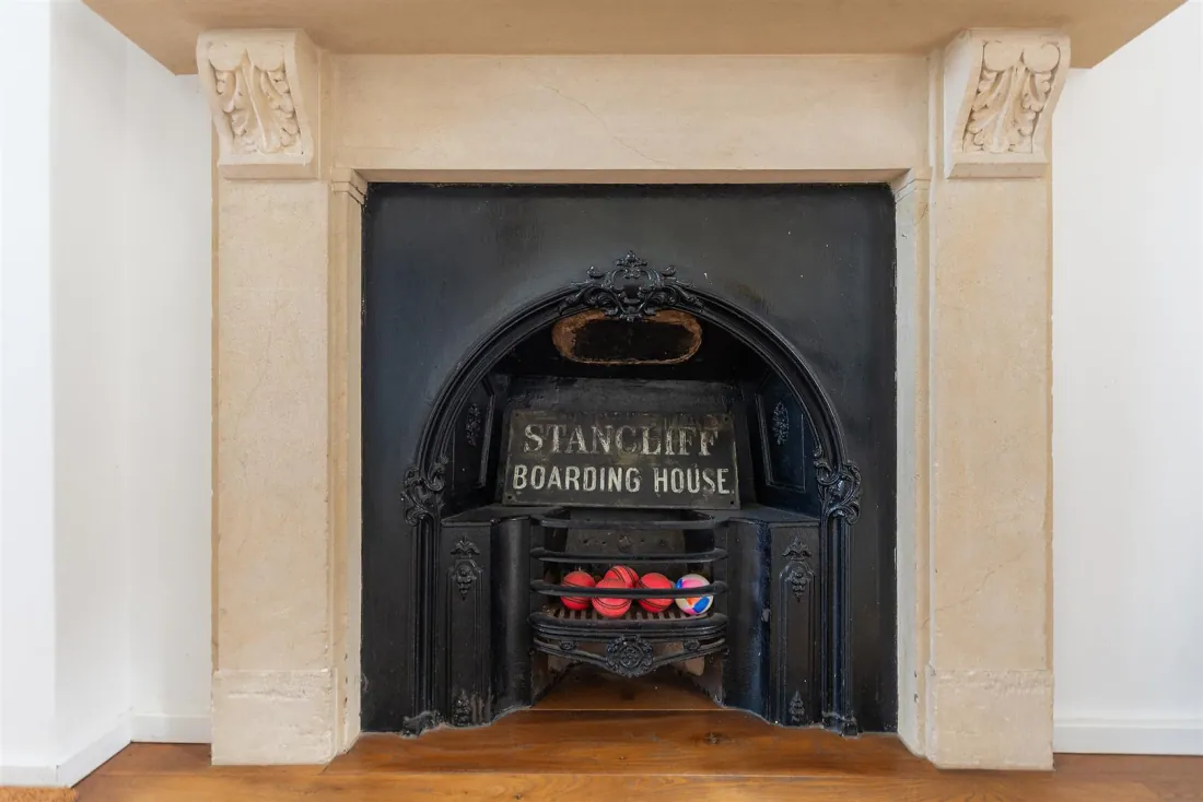 The original Stancliff Boarding House fireplate.