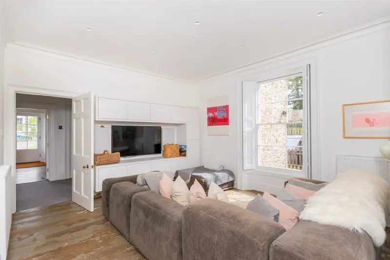 A second sitting room with a marble chimneypiece.