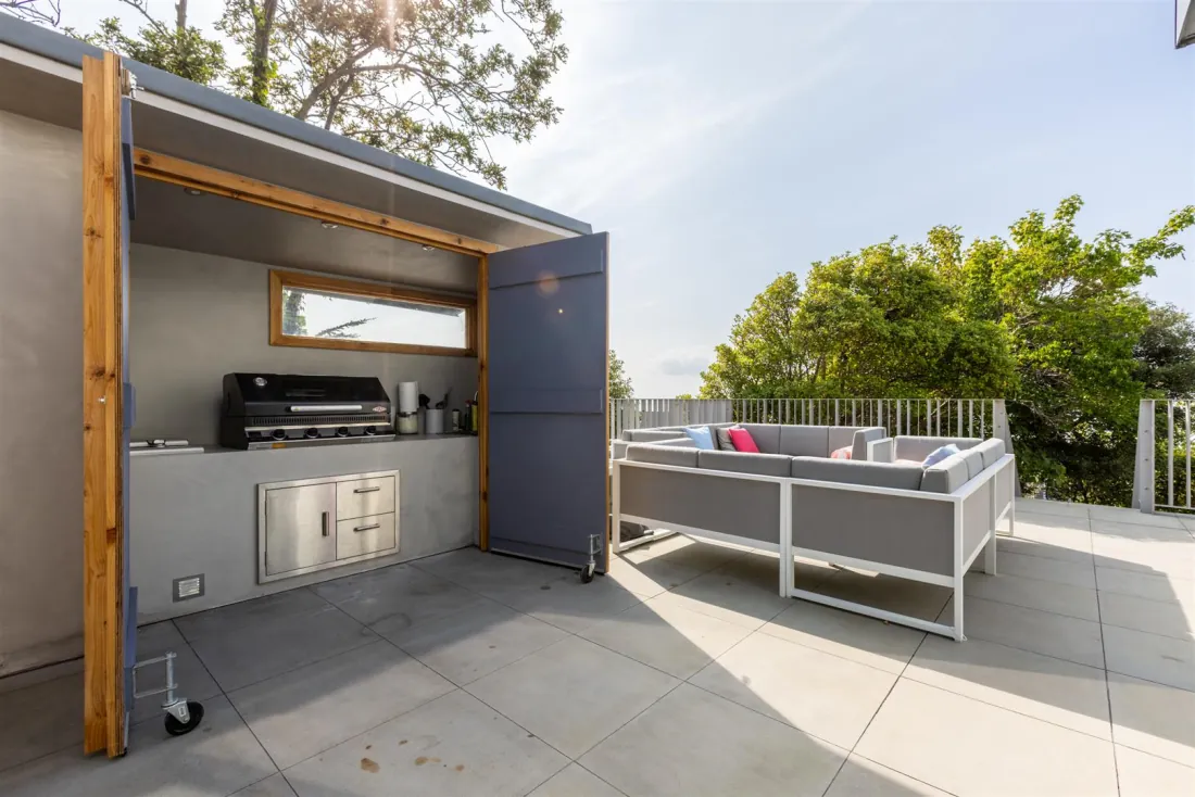 The cedar-clad outdoor kitchen.