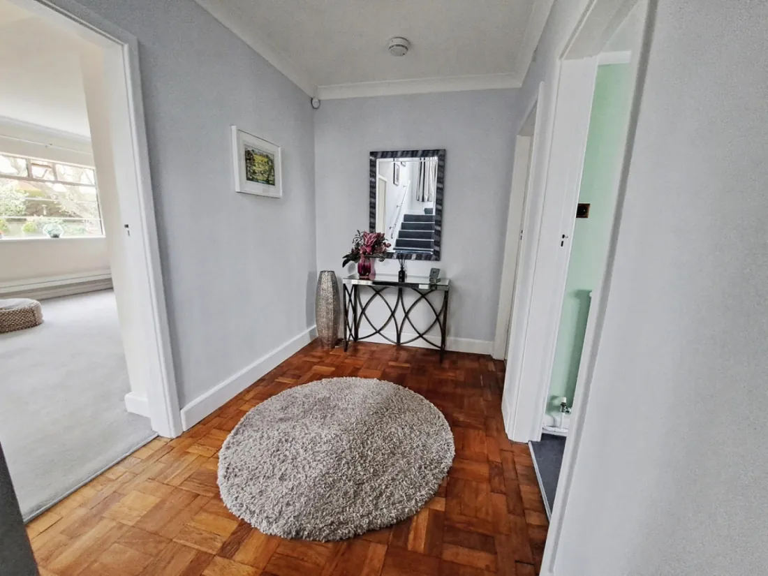 The open-plan kitchen, dining and family room — over 28ft wide, opening to the garden