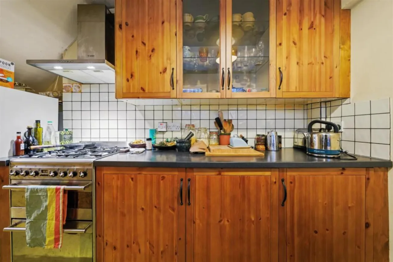 Pine cabinetry and range cooker