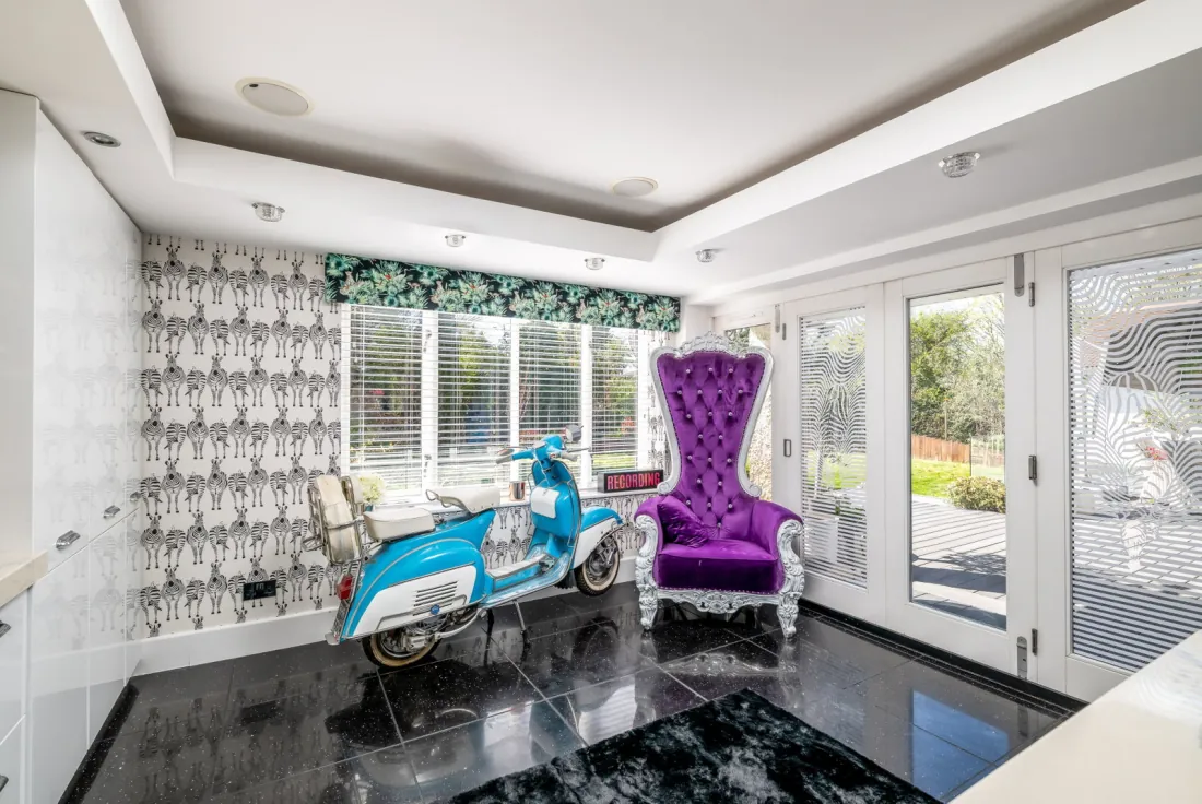 Third reception with Lambretta and bi-fold doors to the deck
