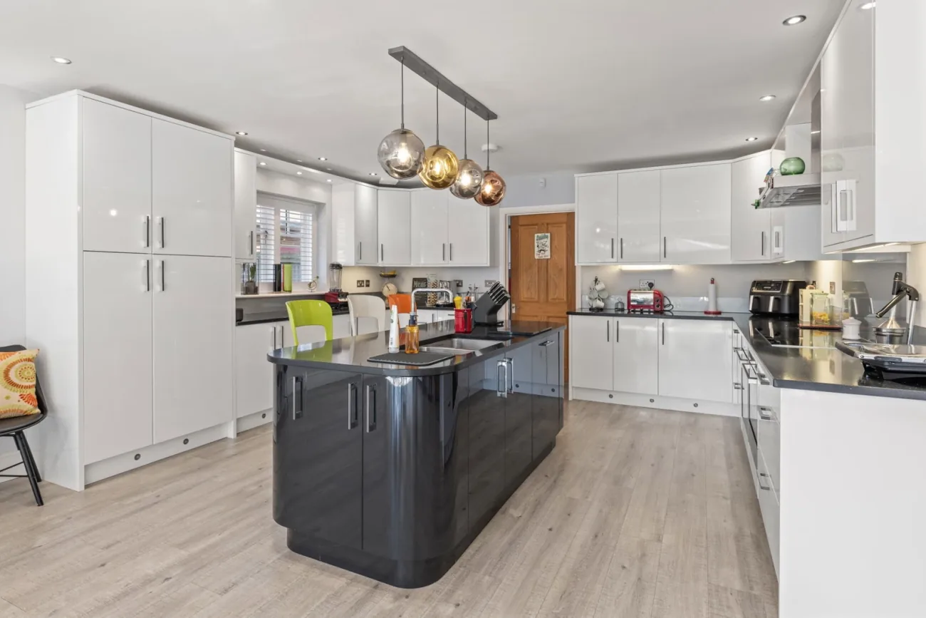 Kitchen island detail with pendant lighting.